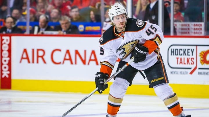 Feb 15, 2016; Calgary, Alberta, CAN; Anaheim Ducks defenseman Sami Vatanen (45) controls the puck against the Calgary Flames during the second period at Scotiabank Saddledome. Mandatory Credit: Sergei Belski-USA TODAY Sports