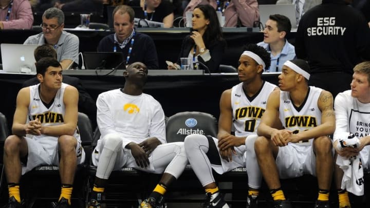 Mar 10, 2016; Indianapolis, IN, USA; The Iowa Hawkeye bench reacts during the closing seconds of their game against Illinois Fighting Illini during the Big Ten Conference tournament at Bankers Life Fieldhouse. Mandatory Credit: Thomas Joseph-USA TODAY Sports