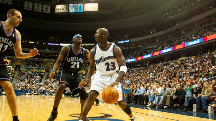 WASHINGTON, DC - NOVEMBER 06: Michael Jordan of the Washington Wizards and Darius Miles and Zydrunas Ilgauskas of the Cleveland Cavaliers in action during a game at The MCI Center on November 06, 2002 in Washington DC, USA. (Photo by Simon Bruty/Anychance/Getty Images)