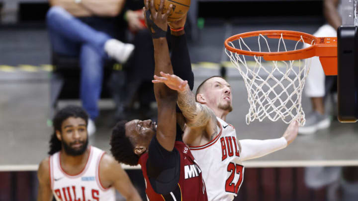 Bam Adebayo #13 of the Miami Heat dunks on Daniel Theis #27 of the Chicago Bulls( (Photo by Michael Reaves/Getty Images)