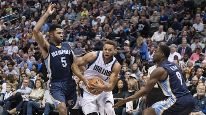 Nov 18, 2016; Dallas, TX, USA; Dallas Mavericks guard Justin Anderson (1) drives to the basket past Memphis Grizzlies guard Andrew Harrison (5) and guard Tony Allen (9) during the first half at the American Airlines Center. Mandatory Credit: Jerome Miron-USA TODAY Sports