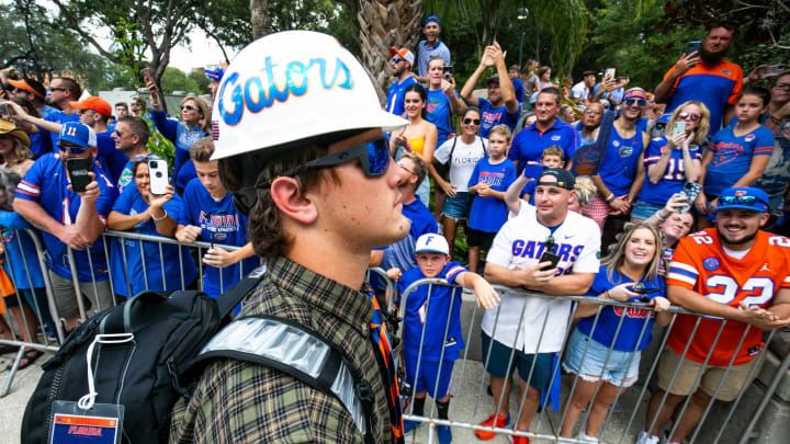 Florida Gators tight end Nick Elksnis (84) arrives with his game face on while wearing a Gators hard hat as the Florida Gators arrived for Gator Walk as they were greeted by fans before playing the Tennessee Volunteers Saturday September 25, 2021 at Ben Hill Griffin Stadium in Gainesville, FL. [Doug Engle/GainesvilleSun]2021Flgai 092521 Gatorsvsvolsgatorwalk