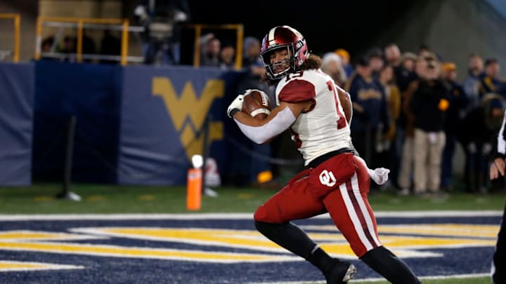 MORGANTOWN, WV – NOVEMBER 23: Caleb Kelly #19 of the Oklahoma Sooners recovers a fumble for a 10 yard touchdown against the West Virginia Mountaineers on November 23, 2018 at Mountaineer Field in Morgantown, West Virginia. (Photo by Justin K. Aller/Getty Images)