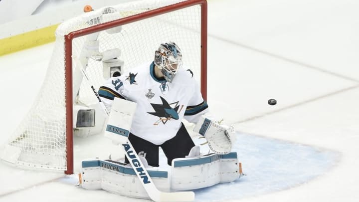 Jun 1, 2016; Pittsburgh, PA, USA; San Jose Sharks goalie Martin Jones (31) makes a save against the Pittsburgh Penguins in the first period in game two of the 2016 Stanley Cup Final at Consol Energy Center. Mandatory Credit: Don Wright-USA TODAY Sports