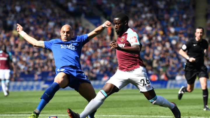 LEICESTER, ENGLAND - MAY 05: Yohan Benalouane of Leicester City and Arthur Masuaku of West Ham United battle for possession during the Premier League match between Leicester City and West Ham United at The King Power Stadium on May 5, 2018 in Leicester, England. (Photo by Michael Regan/Getty Images)