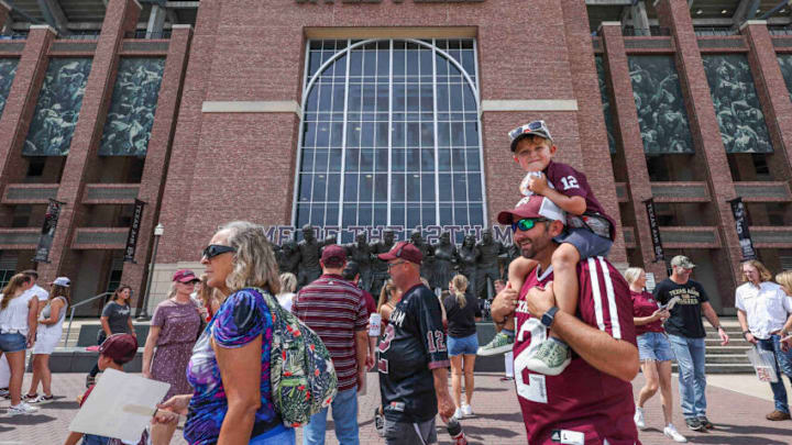 Sep 16, 2023; College Station, Texas, USA; Fans walk in front of Kyle Field before the game between the Texas A&M Aggies and the UL Monroe Warhawks. Mandatory Credit: Troy Taormina-USA TODAY Sports