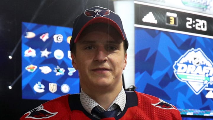 VANCOUVER, BRITISH COLUMBIA – JUNE 22: Aliaksei Protas, 91st overall pick of the Washington Capitals, stand on the draft floor during Rounds 2-7 of the 2019 NHL Draft at Rogers Arena on June 22, 2019 in Vancouver, Canada. (Photo by Dave Sandford/NHLI via Getty Images)