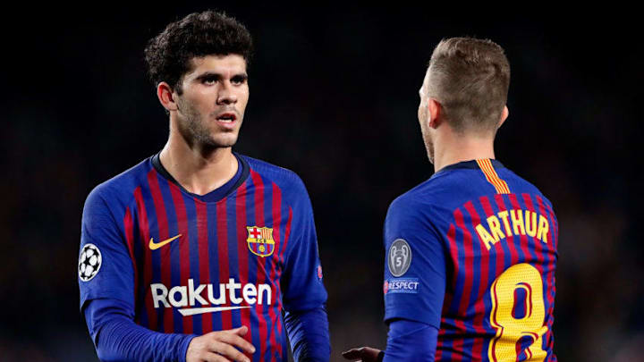 BARCELONA, SPAIN - DECEMBER 11: (L-R) Carles Alena of FC Barcelona, Arthur of FC Barcelona during the UEFA Champions League match between FC Barcelona v Tottenham Hotspur at the Camp Nou on December 11, 2018 in Barcelona Spain (Photo by Jeroen Meuwsen/Soccrates/Getty Images)