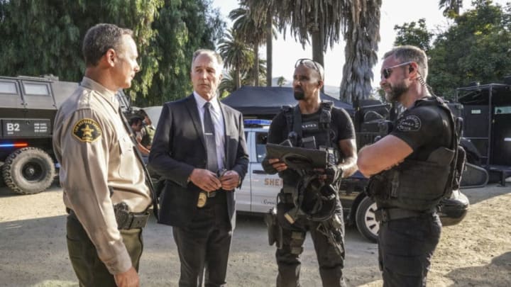 "Lion's Den" -- The SWAT team engages in tense negotiations with a family that takes a local officer hostage when they're evicted from their home due to eminent domain. Also, Hondo reflects on his personal life choices as he helps his father through a medical crisis and Chris' relationship with Kira and Ty reaches a critical juncture, on S.W.A.T., Wednesday, Nov. 20 (10:00-11:00 PM, ET/PT) on the CBS Television Network. Pictured (L-R): Patrick St. Esprit as Commander Robert Hicks, Shemar Moore as Daniel "Hondo" Harrelson, and Jay Harrington as David "Deacon" Kay. Photo: Bill Inoshita/CBS ©2019 CBS Broadcasting, Inc. All Rights Reserved