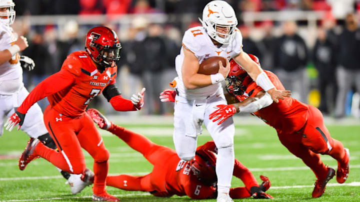 LUBBOCK, TX - NOVEMBER 10: Sam Ehlinger #11 of the Texas Longhorns runs with the ball during the 2nd half of the game against the Texas Tech Red Raiders on November 10, 2018 at Jones AT&T Stadium in Lubbock, Texas. Texas defeated Texas Tech 41-34. (Photo by John Weast/Getty Images)