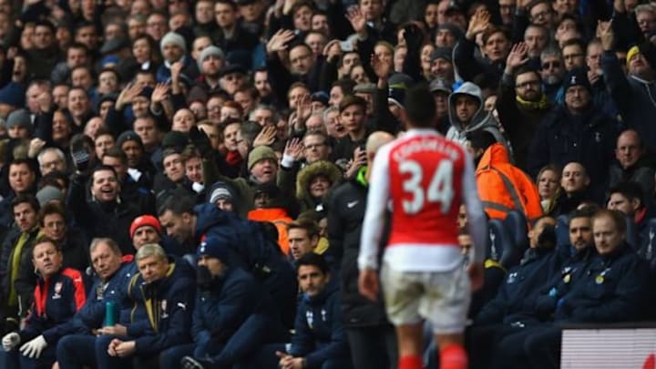 LONDON, ENGLAND - MARCH 05: Arsene Wenger (3rd L) Manager of Arsenal watches Francis Coquelin walking off the pitch after his red card during the Barclays Premier League match between Tottenham Hotspur and Arsenal at White Hart Lane on March 5, 2016 in London, England. (Photo by Shaun Botterill/Getty Images)