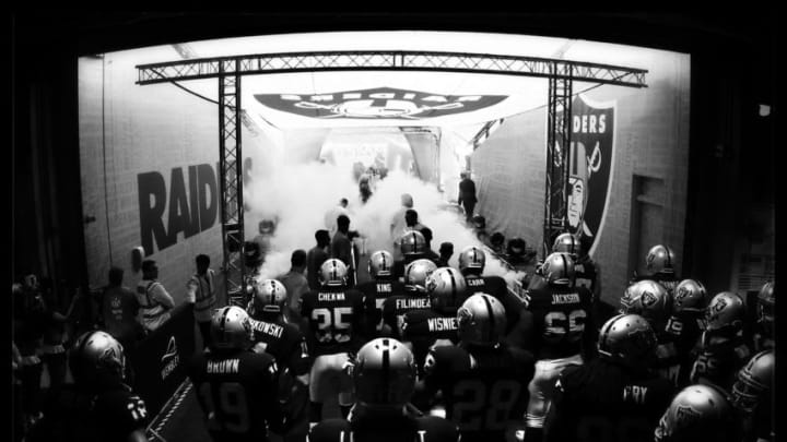 LONDON, ENGLAND - SEPTEMBER 28: (EDITORS NOTE: DIGITAL FILTERS WERE USED IN THE CREATION OF THIS IMAGE) The Raiders take to the field prior to kickoff during the NFL match between the Oakland Raiders and the Miami Dolphins at Wembley Stadium on September 28, 2014 in London, England. (Photo by Richard Heathcote/Getty Images)