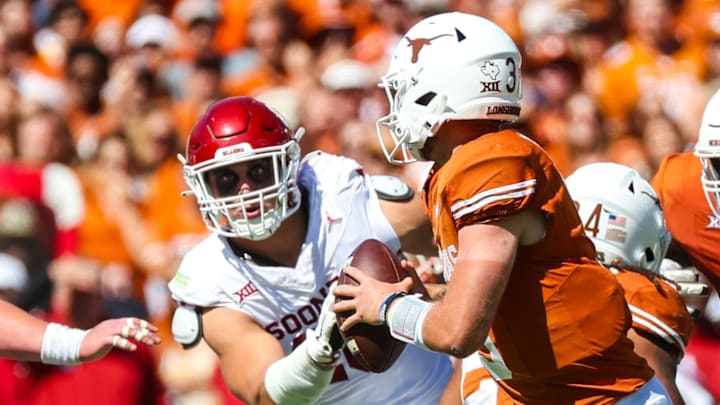 Oct 7, 2023; Dallas, Texas, USA; Oklahoma Sooners defensive lineman Ethan Downs (40) rushes on Texas Longhorns quarterback Quinn Ewers (3) during the game at the Cotton Bowl. Mandatory Credit: Kevin Jairaj-USA TODAY Sports