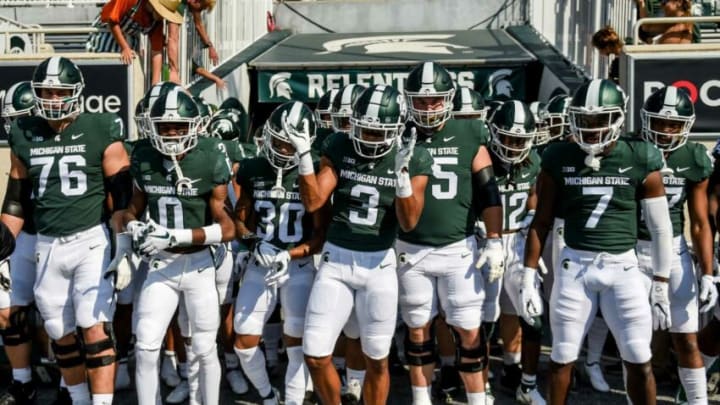 The defense takes the field before Michigan State's football game against Youngstown State on Saturday, Sept. 11, 2021, in East Lansing.210911 Msu Youngstown Fb 050a