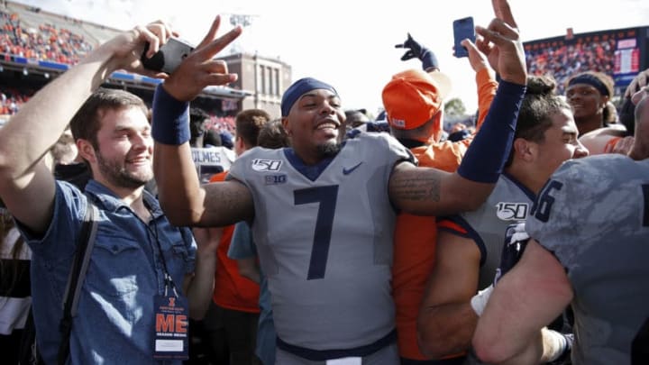 CHAMPAIGN, IL - OCTOBER 19: Stanley Green #7 of the Illinois Fighting Illini celebrates with fans after the game against the Wisconsin Badgers at Memorial Stadium on October 19, 2019 in Champaign, Illinois. Illinois defeated Wisconsin 24-23. (Photo by Joe Robbins/Getty Images)