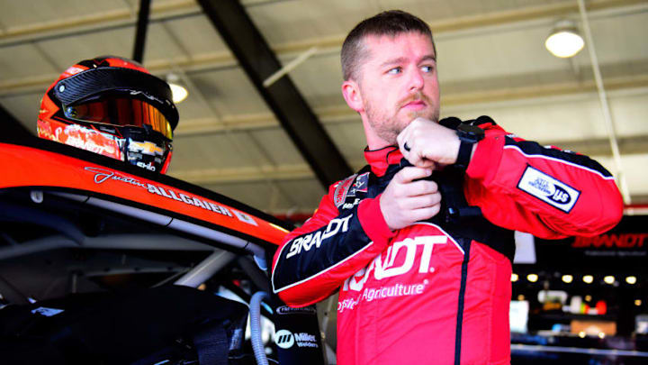 FONTANA, CA - MARCH 15: Justin Allgaier, driver of the #7 BRANDT Professional Agriculture Cherolet, stands in the garage area during practice for the NASCAR Xfinity Series Production Alliance Group 300 at Auto Club Speedway on March 15, 2019 in Fontana, California. (Photo by Jared C. Tilton/Getty Images)