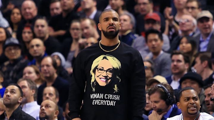 TORONTO, ON - NOVEMBER 16: Drake looks on from his courtside seat during the second half of an NBA game between the Golden State Warriors and the Toronto Raptors at Air Canada Centre on November 16, 2016 in Toronto, Canada. NOTE TO USER: User expressly acknowledges and agrees that, by downloading and or using this photograph, User is consenting to the terms and conditions of the Getty Images License Agreement. (Photo by Vaughn Ridley/Getty Images)
