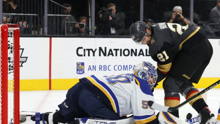 LAS VEGAS, NEVADA - OCTOBER 20: Jordan Binnington #50 of the St. Louis Blues makes a save against Brett Howden #21 of the Vegas Golden Knights in the second period of their game at T-Mobile Arena on October 20, 2021 in Las Vegas, Nevada. The Blues defeated the Golden Knights 3-1. (Photo by Ethan Miller/Getty Images)