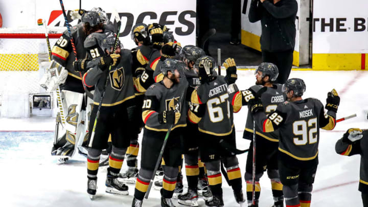 The Vegas Golden Knights celebrate with Robin Lehner after the teams 3-0 victory against the Vancouver Canucks in Game Seven of the Western Conference Second Round. (Photo by Bruce Bennett/Getty Images)