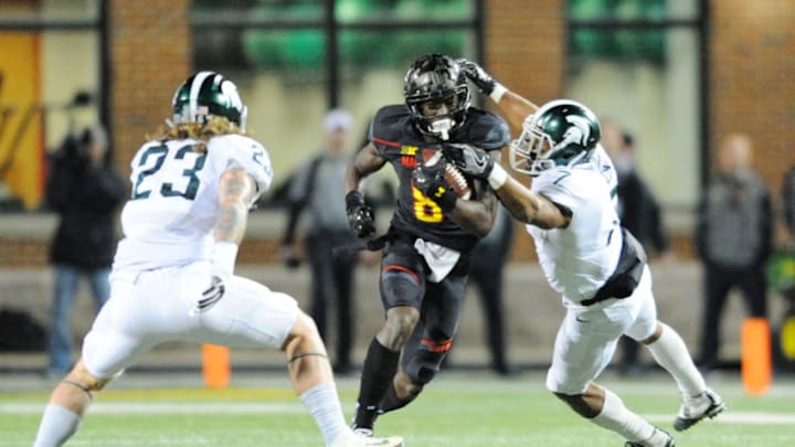 22 October 2016: Maryland Terrapins wide receiver Levern Jacobs (8) catches a pass in the second quarter and is brought down by Michigan State Spartans defensive back Demetrious Cox (7) at Capital One Field in College Park, MD. (Photo by Mark Goldman/Icon Sportswire via Getty Images)