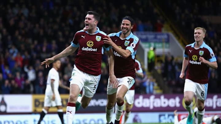 BURNLEY, ENGLAND - SEPTEMBER 26: Michael Keane of Burnley (L) celebrates scoring his sides second goal with team George Boyd of Burnley (R) during the Premier League match between Burnley and Watford at Turf Moor on September 26, 2016 in Burnley, England. (Photo by Clive Brunskill/Getty Images)