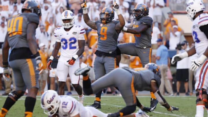 KNOXVILLE, TN - SEPTEMBER 24: Derek Barnett #9 of the Tennessee Volunteers celebrates after sacking Austin Appleby #12 of the Florida Gators in the second half at Neyland Stadium on September 24, 2016 in Knoxville, Tennessee. Tennessee defeated Florida 38-28. (Photo by Joe Robbins/Getty Images)