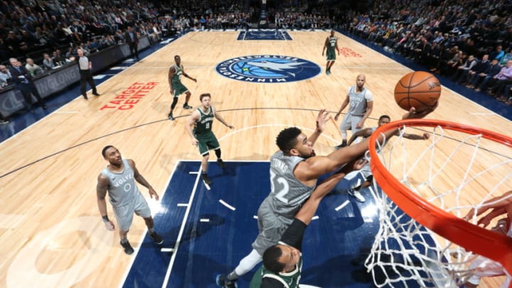 MINNEAPOLIS, MN - FEBRUARY 1: Karl-Anthony Towns #32 of the Minnesota Timberwolves handles the ball against the Milwaukee Bucks on February 1, 2018 at Target Center in Minneapolis, Minnesota. NOTE TO USER: User expressly acknowledges and agrees that, by downloading and or using this Photograph, user is consenting to the terms and conditions of the Getty Images License Agreement. Mandatory Copyright Notice: Copyright 2018 NBAE (Photo by David Sherman/NBAE via Getty Images)