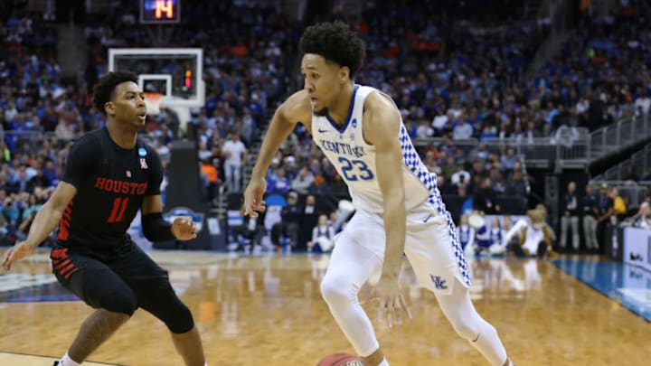 KANSAS CITY, MO - MARCH 29: Kentucky Wildcats forward EJ Montgomery (23) drives on Houston Cougars guard Nate Hinton (11) in the first half of an NCAA Midwest Regional Sweet Sixteen game between the Houston Cougars and Kentucky Wildcats on March 29, 2019 at Sprint Center in Kansas City, MO. (Photo by Scott Winters/Icon Sportswire via Getty Images)