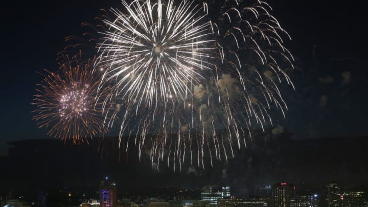 BOSTON, MA - JULY 04: Fireworks explode over the Charles River with the city of Cambridge in the background during Boston July 4th celebrations on July 4, 2013 in Boston, Massachusetts. Security has been tightened around Boston's celebrations this year in the wake of the Boston Marathon bombings which occurred on Patriots' Day in April. (Photo by Mario Tama/Getty Images)