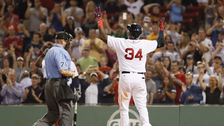 Jun 16, 2016; Boston, MA, USA; Boston Red Sox designated hitter David Ortiz (34) reacts on home plate after hitting a home run against the Baltimore Orioles in the ninth inning at Fenway Park. Baltimore Orioles defeated the Boston Red Sox 5-1. Mandatory Credit: David Butler II-USA TODAY Sports