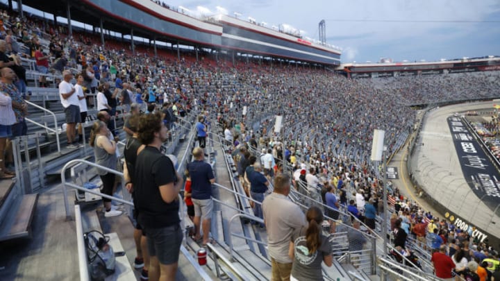 BRISTOL, TENNESSEE - JULY 15: Fans stand during pre-race ceremonies prior to the NASCAR Cup Series All-Star Race at Bristol Motor Speedway on July 15, 2020 in Bristol, Tennessee. (Photo by Patrick Smith/Getty Images)