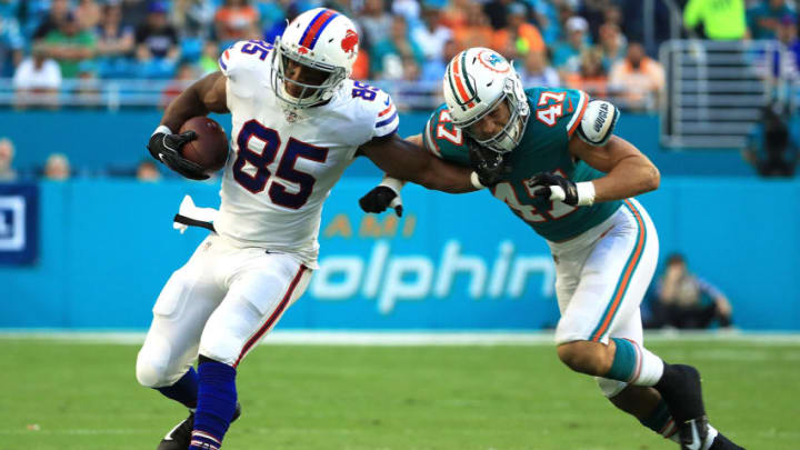 MIAMI GARDENS, FL - DECEMBER 31: Charles Clay #85 of the Buffalo Bills stiff arms Kiko Alonso #47 of the Miami Dolphins during the first quarter at Hard Rock Stadium on December 31, 2017 in Miami Gardens, Florida. (Photo by Mike Ehrmann/Getty Images)