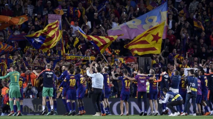 BARCELONA, SPAIN - MAY 06: Barcelon players celebrate with fans after the La Liga match between Barcelona and Real Madrid at Camp Nou on May 6, 2018 in Barcelona, Spain. (Photo by Alex Caparros/Getty Images)