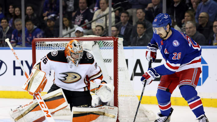 Mar 15, 2022; New York, New York, USA; New York Rangers left wing Chris Kreider (20) plays the puck against Anaheim Ducks goaltender John Gibson (36) during the third period at Madison Square Garden. Mandatory Credit: Brad Penner-USA TODAY Sports