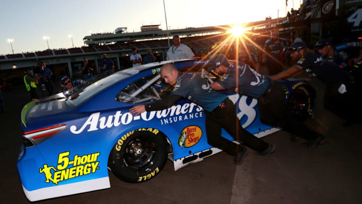 PHOENIX, AZ - NOVEMBER 09: Crew members push the #78 Auto-Owners Insurance Toyota, driven by Martin Truex Jr., out to qualifying for the Monster Energy NASCAR Cup Series Can-Am 500 at ISM Raceway on November 9, 2018 in Phoenix, Arizona. (Photo by Sean Gardner/Getty Images)