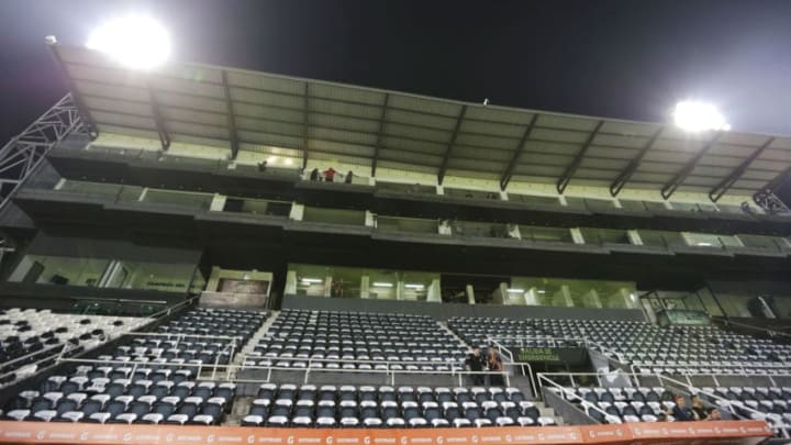 ASUNCION, PARAGUAY - MARCH 11: Empty stands of the stadium as only security personnel were admitted during a match between Olimpia and Defensa y Justicia as part of Copa CONMEBOL Libertadores at Tigo Manuel Ferreira Stadium on March 11, 2020 in Asuncion, Paraguay. Paraguayan government determined by presidential decree 3442 on Monday 9th that all massive events must go behind closed doors due to the outbreak of novel Coronavirus (COVID-19). (Photo by Luis Vera/Getty Images)