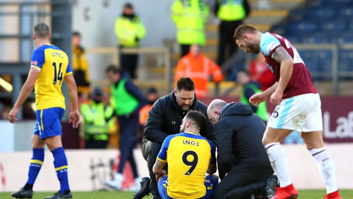 BURNLEY, ENGLAND - FEBRUARY 02: Danny Ings of Southampton receives medical treatment during the Premier League match between Burnley FC and Southampton FC at Turf Moor on February 2, 2019 in Burnley, United Kingdom. (Photo by Alex Livesey/Getty Images)