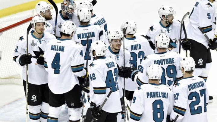 Jun 9, 2016; Pittsburgh, PA, USA; San Jose Sharks goalie Martin Jones (31) celebrates with teammates after defeating the Pittsburgh Penguins in game five of the 2016 Stanley Cup Final at Consol Energy Center. Mandatory Credit: Don Wright-USA TODAY Sports