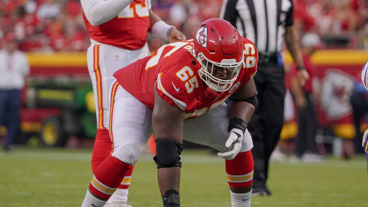 Aug 27, 2021; Kansas City, Missouri, USA; Kansas City Chiefs offensive guard Trey Smith (65) on the line of scrimmage against the Minnesota Vikings during the first quarter at GEHA Field at Arrowhead Stadium. Mandatory Credit: Denny Medley-USA TODAY Sports