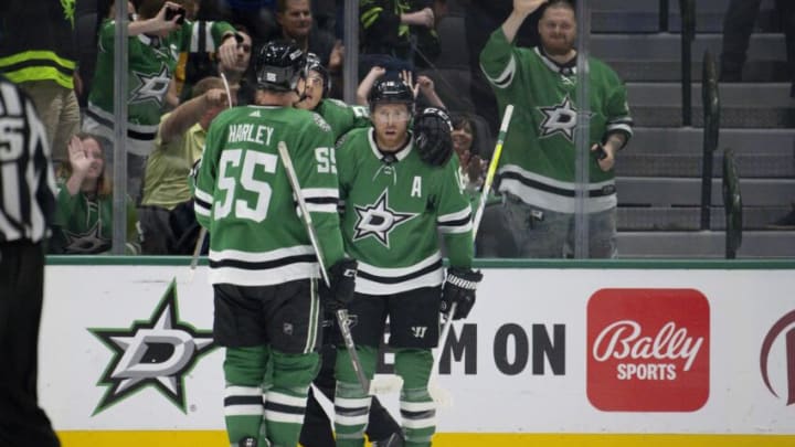 Oct 3, 2023; Dallas, Texas, USA; Dallas Stars defenseman Thomas Harley (55) and left wing Jason Robertson (21) and center Joe Pavelski (16) celebrates a power play goal scored by Pavelski against the Colorado Avalanche during the third period at the American Airlines Center. Mandatory Credit: Jerome Miron-USA TODAY Sports