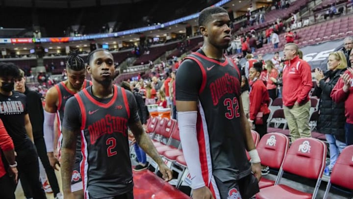 Tue., Mar. 1, 2022; Columbus, Ohio, USA; Ohio State Buckeyes forward E.J. Liddell (32) and Ohio State Buckeyes guard Cedric Russell (2) walk back to the locker room following the Buckeyes’ 78-70 loss to the Nebraska Cornhuskers during a NCAA Division I men’s basketball game at Value City Arena.Sports Mbk Nebraska Cornhuskers At Ohio State Buckeyes