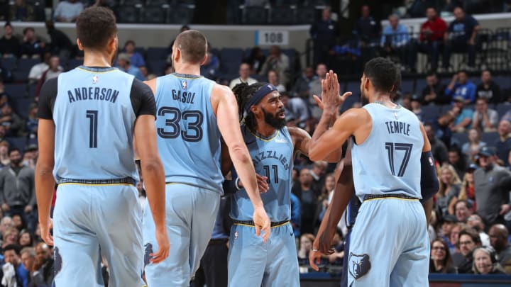 MEMPHIS, TN – NOVEMBER 19: Mike Conley #11 and Garrett Temple #17 of the Memphis Grizzlies high five during the game against the Dallas Mavericks on November 19, 2018 at FedExForum in Memphis, Tennessee. NOTE TO USER: User expressly acknowledges and agrees that, by downloading and/or using this photograph, user is consenting to the terms and conditions of the Getty Images License Agreement. Mandatory Copyright Notice: Copyright 2018 NBAE (Photo by Joe Murphy/NBAE via Getty Images)