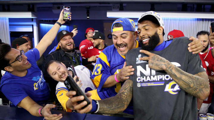 INGLEWOOD, CALIFORNIA – JANUARY 30: Odell Beckham Jr. #3 of the Los Angeles Rams celebrates with fans after defeating the San Francisco 49ers in the NFC Championship Game at SoFi Stadium on January 30, 2022 in Inglewood, California. The Rams defeated the 49ers 20-17. (Photo by Christian Petersen/Getty Images)