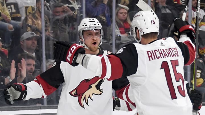 LAS VEGAS, NEVADA – DECEMBER 28: Michael Grabner #40 and Brad Richardson #15 of the Arizona Coyotes celebrate after Grabner scored a first-period goal against the Vegas Golden Knights during their game at T-Mobile Arena on December 28, 2019 in Las Vegas, Nevada. (Photo by Ethan Miller/Getty Images)