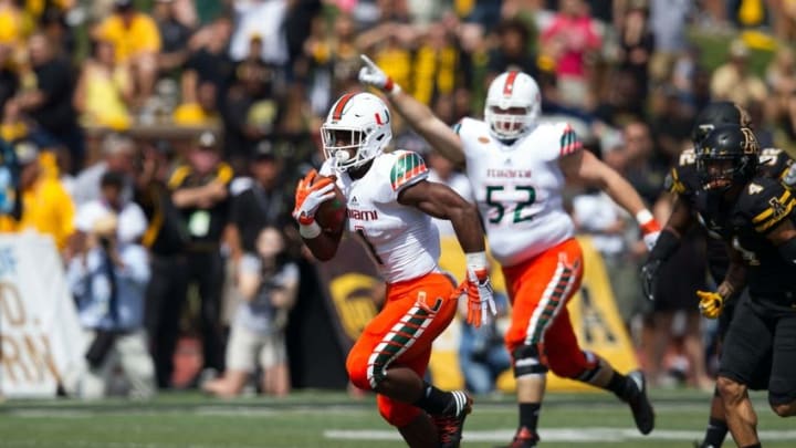 Sep 17, 2016; Boone, NC, USA; Miami Hurricanes running back Mark Walton (1) runs the ball for a touchdown during the first quarter against the Appalachian State Mountaineers at Kidd Brewer Stadium. Mandatory Credit: Jeremy Brevard-USA TODAY Sports