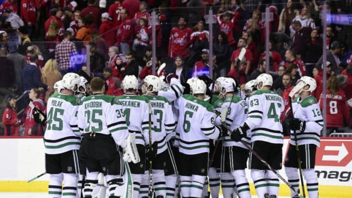 WASHINGTON, DC - NOVEMBER 03: Jason Dickinson #16 of the Dallas Stars celebrates with his teammates after scoring the game winning goal in overtime against the Washington Capitals at Capital One Arena on November 3, 2018 in Washington, DC. (Photo by Patrick McDermott/NHLI via Getty Images)