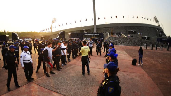 MEXICO CITY, MEXICO - MARCH 06: Security officers stand outside the stadium prior to the 9th round match between Pumas UNAM and America as part of the Torneo Clausura 2020 Liga MX at Olimpico Universitario Stadium on March 6, 2020 in Mexico City, Mexico. (Photo by Jaime Lopez/Jam Media/Getty Images)