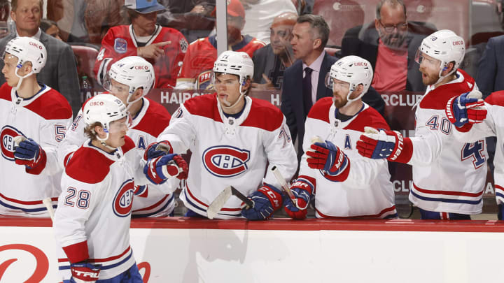 SUNRISE, FL – MARCH 29: Teammates congratulate Christian Dvorak #28 of the Montreal Canadiens after he scored a goal in the second period to tie the game against the Florida Panthers at the FLA Live Arena on March 29, 2022 in Sunrise, Florida. (Photo by Joel Auerbach/Getty Images)