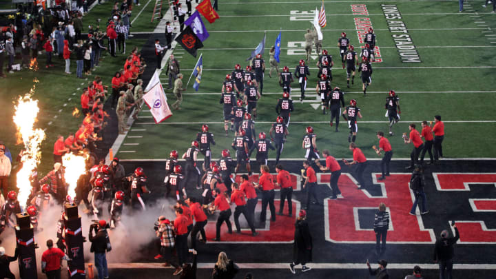 Nov 12, 2022; Lubbock, Texas, USA; The Texas Tech Red Raiders enter the field before the game against the Kansas Jayhawks at Jones AT&T Stadium and Cody Campbell Field. Mandatory Credit: Michael C. Johnson-USA TODAY Sports