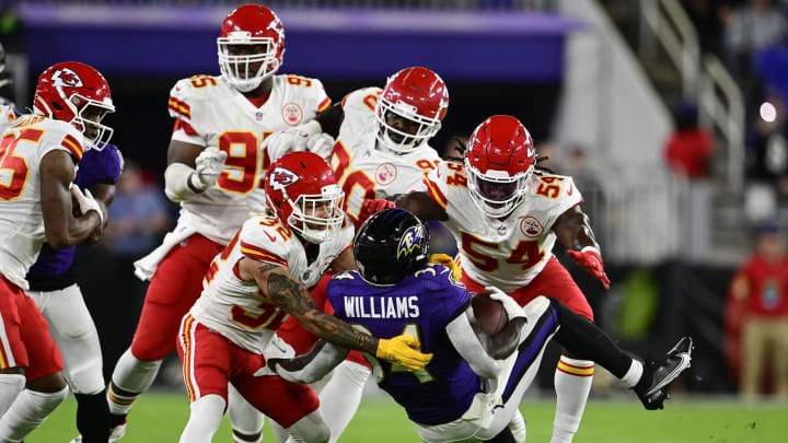 Sep 19, 2021; Baltimore, Maryland, USA; Kansas City Chiefs safety Tyrann Mathieu (32) and linebacker Nick Bolton (54) tackle Baltimore Ravens running back Ty'Son Williams (34) during the first quarter at M&T Bank Stadium. Mandatory Credit: Tommy Gilligan-USA TODAY Sports